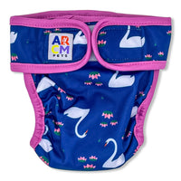 Thumbnail for This blue diaper is digitally printed PUL with swans, pink flowers paired with matching pink binding on the edges. (front)