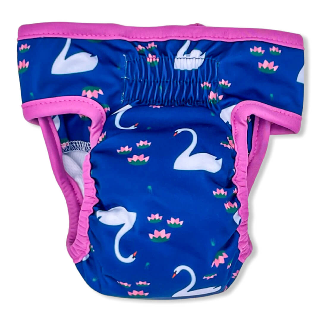 This blue diaper is digitally printed PUL with swans, pink flowers paired with matching pink binding on the edges. (back)