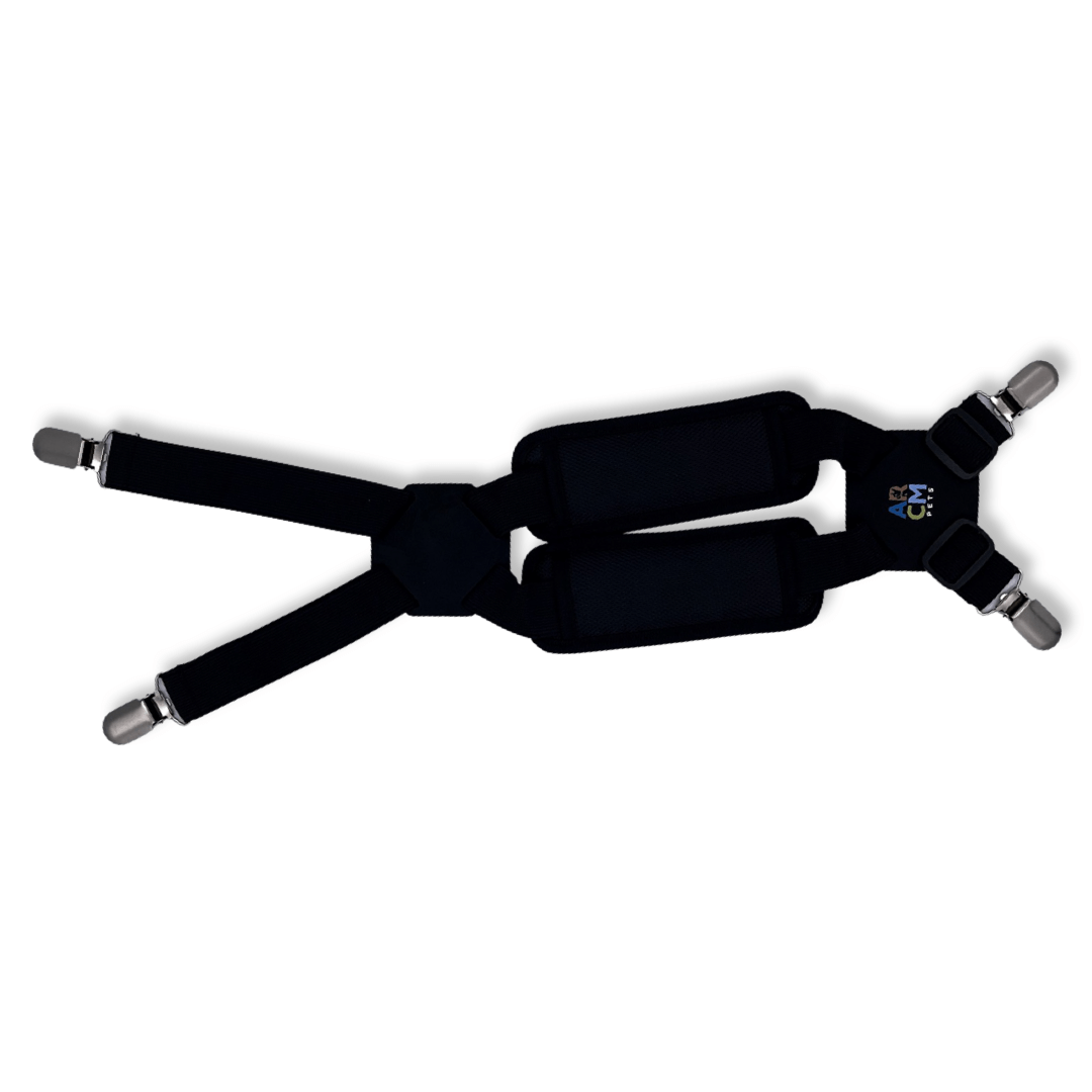 Flat overhead view of the suspenders. They are all black with the ARCM Pets' logo on the backplate. Features four metal clasps on each end, one leather back plate, one leather chest plate, two black shoulder pads and two adjustment bars.