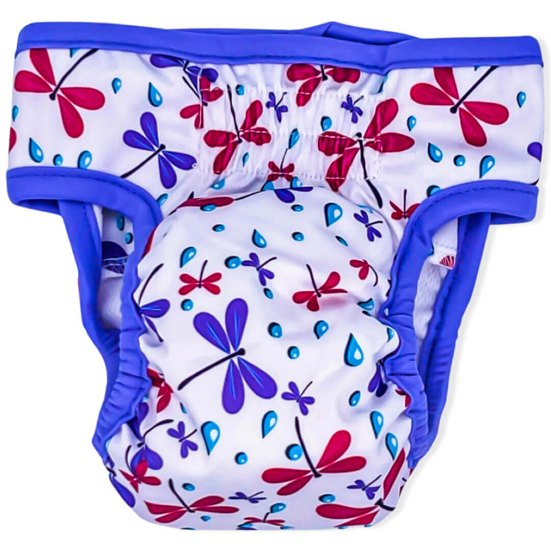 Free Spirit Cheekies are dog diapers. They are white with fuchsia dragonflies, purple dragonflies, blue rain drops and purple binding. (back)