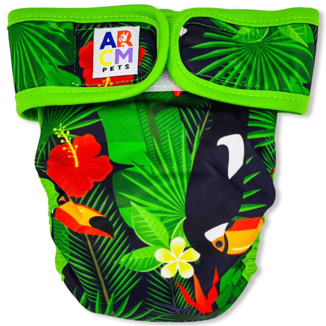 This tropical diaper has a black background with bright green leaves, yellow flowers, red flowers and toucans with matching green binding. (Front)